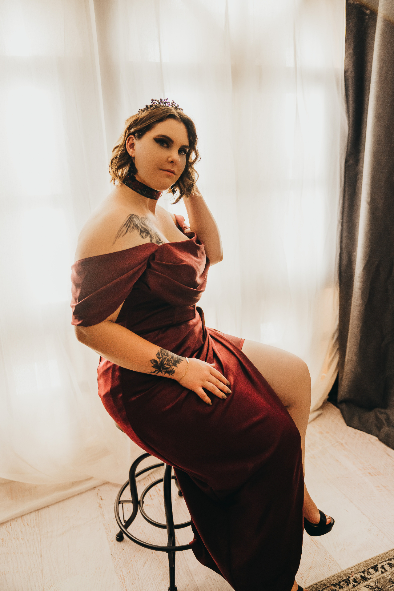 Boudoir portrait in a red satin dress